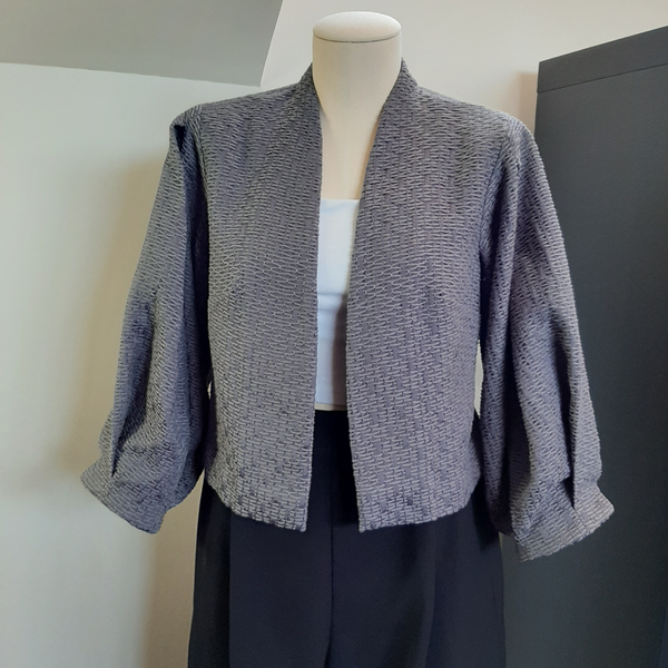 FrocKit 61A -  Vogue 9338 Jacket view A - Unlined jacket with deep pleated sleeves. Grey cotton blend weave or Black loose weave